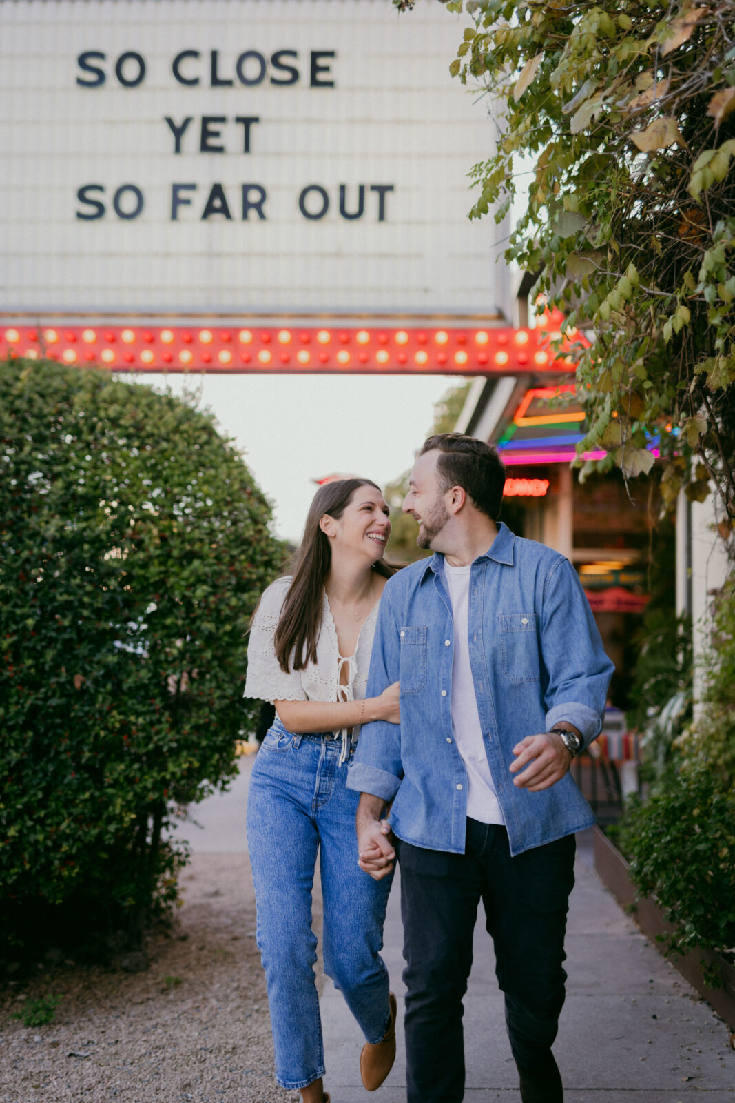 Couple walking laughing